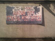 Sign of the Quezon City Post Office in Disrepair